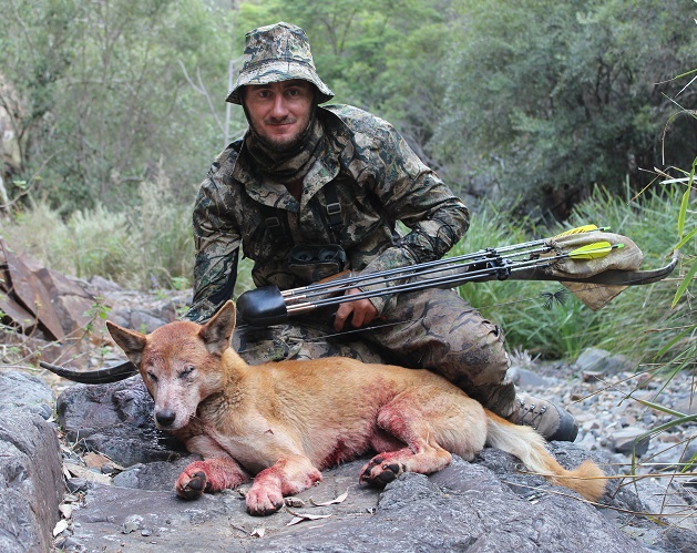 Clint with his $200 bounty dog taken in the back blocks of Jackals Hide in Unnamed Creek.